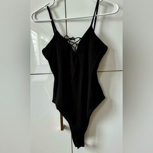 Size  M - Tie front bodysuit in black